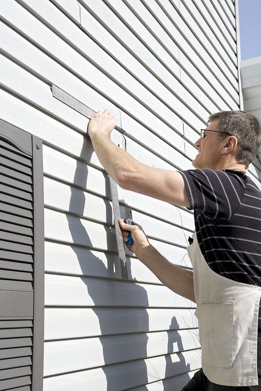Experienced Siding Professionals at Work
